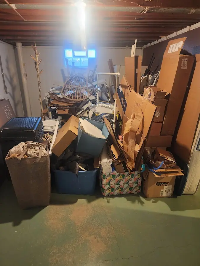 Roll-off dumpster container at job site for 4 Yard Dumpster Rental in Cary